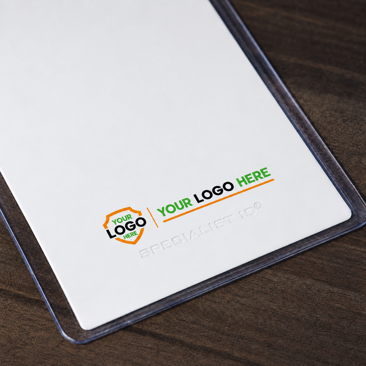 Close-up of compact Your Logo Here shield and horizontal branding along the bottom of an XL46V badge holder.