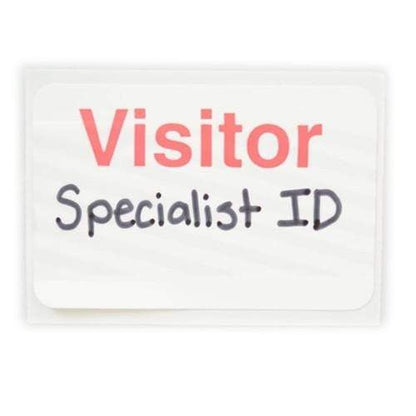 A One Step Manually-Issued Self-Expiring Badge, Box of 500 (P/N T200X) with the word "Visitor" in red and "Specialist ID" handwritten in black underneath, typical of manually-issued badges for visitor identification.