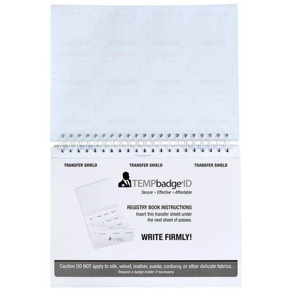 A spiral-bound Expiring Visitor Badge and Log Book - 480 Badges (05741) open to a page with instructions to insert a transfer shield and write firmly. The text at the bottom warns against use on silk, velvet, corduroy, or other delicate fabrics. Ideal for use in any visitor management system.