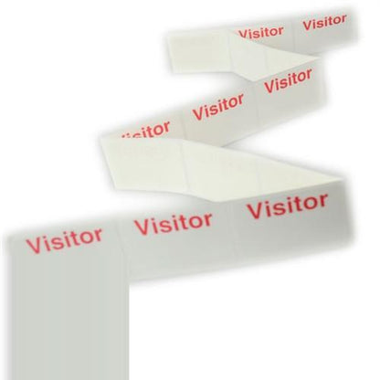 A strip of Frontpart Preprinted One Day Self Expiring Badges - Box of 1,000 (P/N T610X) with the word "Visitor" printed in red on each sticker enhances security measures by ensuring each badge is only valid for one day.