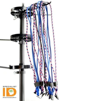 An ID lanyard rack displaying several blue and red EK Lanyards with Bulldog Clip (10329) by EK USA, positioned next to a logo that says "Specialist ID Photography.