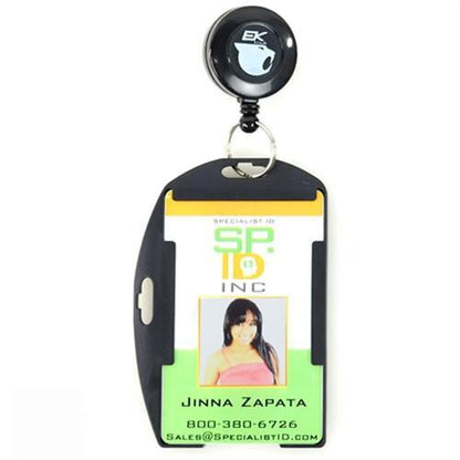 Image of a Specialist ID badge with a retractable reel and Black EK Dual Sided Smart Card Holder with Slot Holes (10574) by EK USA. The badge shows a photo, name "Jinna Zapata," company "SP ID Inc," phone number "800-380-6726," and email "Sales@SpecialistID.com".