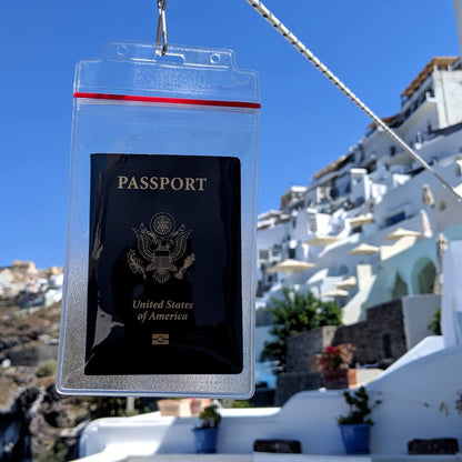 Clear 4x6 credential holder hanging from lanyard in travel setting