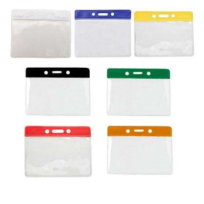 Seven clear plastic ID card holders with different-colored top borders (white, blue, yellow, black, green, red, and orange) arranged in two rows. These Horizontal Vinyl Badge Holder with Color Bar Top - Great for Color Coding Access and ID (1820-100X) are perfect for color-coded identification.