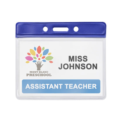 A **Horizontal Vinyl Badge Holder with Color Bar Top - Great for Color Coding Access and ID (1820-100X)** with "Mont Blanc Preschool," "Miss Johnson," and "Assistant Teacher" printed on it in a clear plastic ID card holder with a blue top.