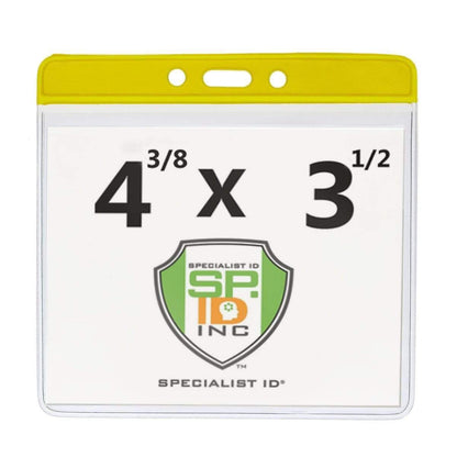A clear vinyl badge holder with a yellow top, displaying "4 x 3 1/2" and a logo with the text "Specialist ID Inc" on it has been replaced by the product name Extra Large Color Code Badge Holder for 4x3 Badges - Horizontal Vinyl with Color Bar (1820-120X).