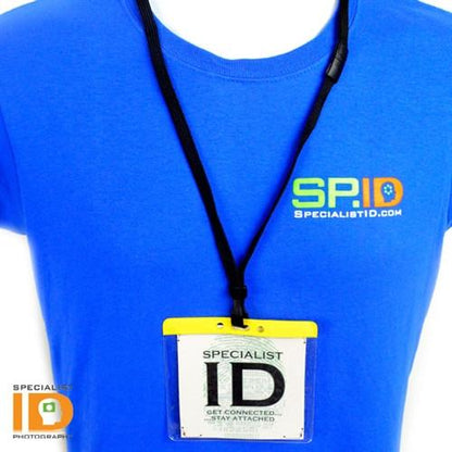 A person wearing a blue shirt with the "SPECIALISTID.COM" logo and a lanyard holding an Extra Large Color Code Badge Holder for 4x3 Badges - Horizontal Vinyl with Color Bar (1820-120X) that reads "SPECIALIST ID Get Connected...Stay Attached.
