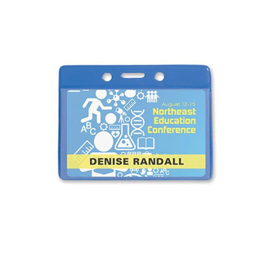 A blue conference name badge for the "Northeast Education Conference" showing the name "Denise Randall" with various educational icons in the background. The Horizontal Vinyl Color-Back Badge Holder (P/N 1820-200X) allows for quick identification among attendees.