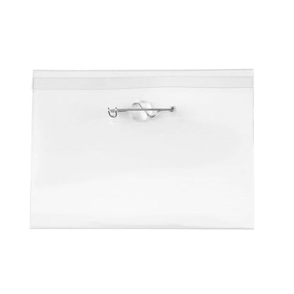 A Clear Rigid Vinyl 4X3 Name Tag Holder W/ Nickel Plated Steel Pin (P/N 1825-2400) with a 4" x 3" size and a hook clasp attachment in the center.