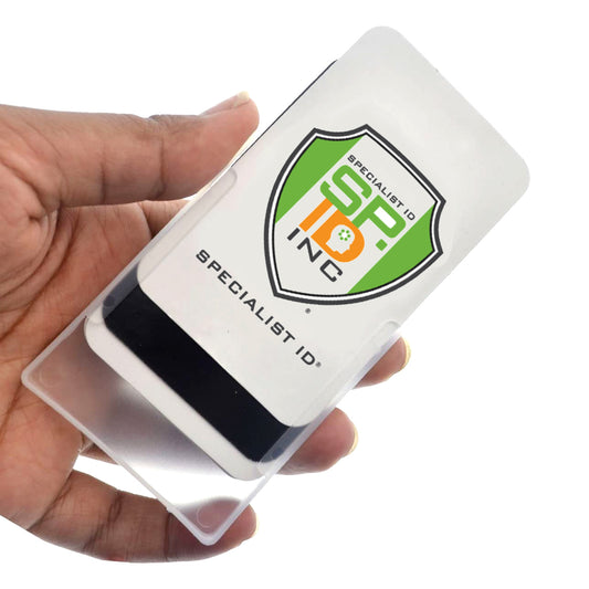 A hand holding a Semi-Rigid Multiple ID Card Holder (P/N 1840-3025) with a card inside displaying "Specialist ID Inc." and a green and orange logo.