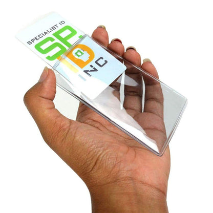 A hand holds a transparent Heavy Duty Vertical Proximity Card Holder (P/N 1840-5057) displaying a card with the "Specialist ID Inc" logo inside.