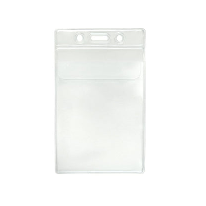 A Clear 2 7/8" X 4" Vinyl Vertical Large Badge Holder With Tuck-In Flap (P/N 1840-5150) with two circular holes and one oblong hole at the top for attaching a lanyard or clip. The large credential holder is empty and laid flat.