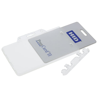 Image of a partially open Clear Horizontal Permanent Locking Plastic Card Holder (P/N 1840-6040) displaying a HID ProxCard II inside. An additional mounting clip is seen next to the proximity card holder.