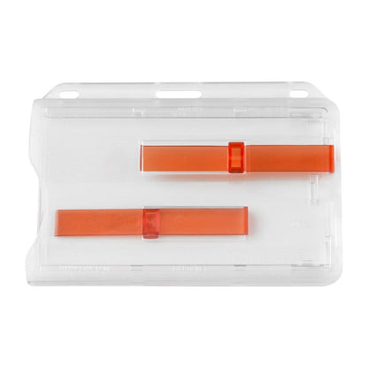 Transparent plastic case containing two flat, rectangular red objects, each with a small red band near the center—a 2 Card Badge Holder with Slide (P/N 1840-6400) designed for efficiency.