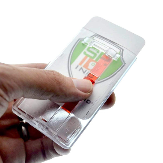 A hand holding a Frosted Vertical Rigid ID Badge Holder with Red Extractor Slide (P/N 1840-6566) with a SIM card ejector tool inside a transparent plastic case with a SIM card.