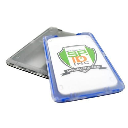 Two ID card badge holders, one in black and one in blue, with a visible logo and website, are displayed. These B-Holder Rigid Plastic Vertical Holder (P/N 1840-664X) are made from rigid plastic for durability.