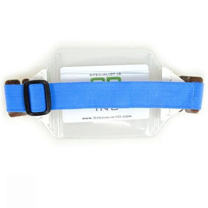A Vinyl Horizontal Arm Band Badge Holder With Elastic Strap (P/N 1840-7000) lies flat. The Vinyl Horizontal Arm Band Badge Holder With Elastic Strap (P/N 1840-7000) partially reveals an ID card inside.