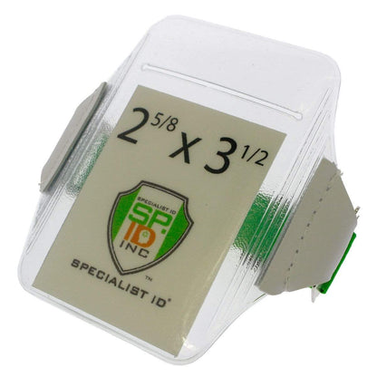 Clear heavy-duty vinyl ID badge holder with a gray backing and green interior, branded "Oversize Vertical Armband Badge Holder (1840-7110)" and measuring 2 5/8 x 3 1/2 inches. Sold by Specialist ID.