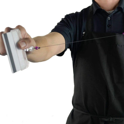 The person is demonstrating the use of a Swiple Card Holder - Rigid Horizontal Half Card Badge Holder - Leaves Mag Stripe Exposed for Easy Swiping (1840-8000), extending the cord while holding a white access control card.