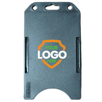 A grey vertical plastic card holder with two slots on each side and a recess at the top for attaching a clip. The center features a shield with the text "Your Logo Here," making it one of our finest Custom Vertical Open Faced Plastic ID Badge Holder (1840-816X) - Upload Your Logo.