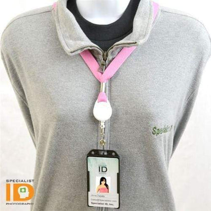 A mannequin wearing a gray shirt with a photo ID badge in a pink lanyard around its neck. The rigid plastic design of the Vertical Open Face Plastic ID Holder (1840-816X) prominently displays the word "Specialist.