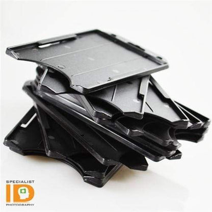 A stack of black Vertical Open Face Plastic ID Holders (1840-816X) is shown against a white background. A logo in the bottom left corner reads "Specialist ID Photography.