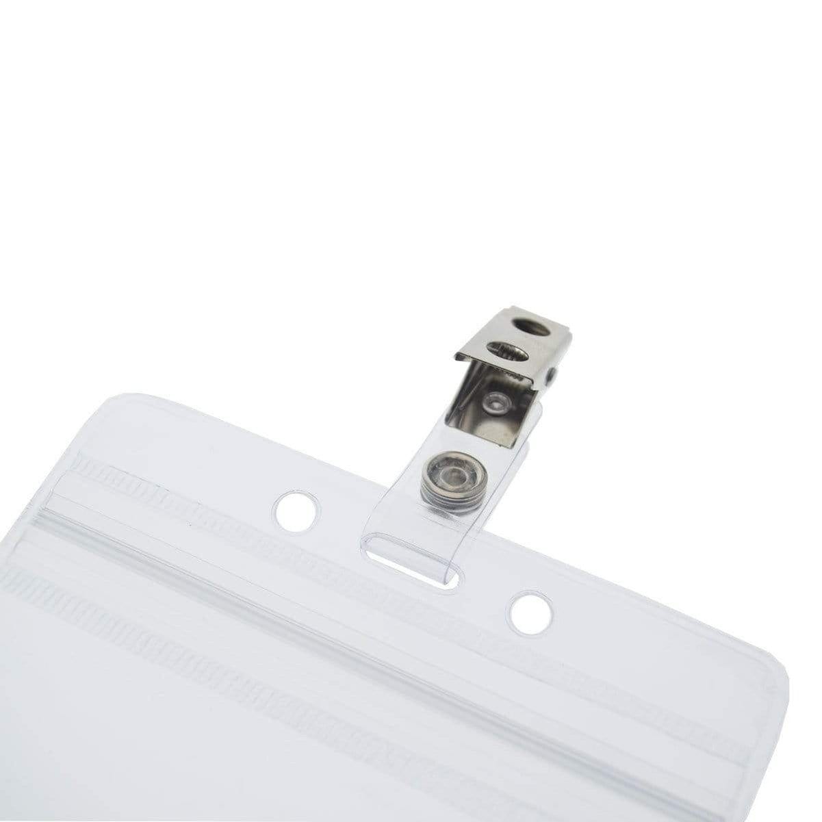 Clear plastic badge holder with a metal clip attached at the top. The ID Badge Strap Clips (Industry Standard Clip), featuring two holes and a secure zipper closure, is perfect for use with ID badge clips.