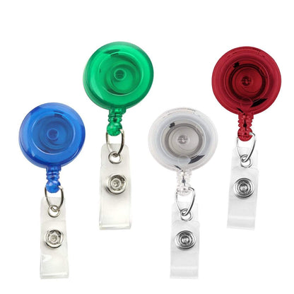 Four Translucent Retractable Badge Reels with Non-Swivel Spring Clip (P/N 2120-473X) in blue, green, white, and red colors with metal clips and transparent straps, each featuring a durable retractable cord for easy access to your ID badge holder.