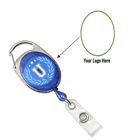 A Custom Printed Oval Shaped Carabiner Badge Reel - Online Designer - Add Personalized Logo or Graphic with a "U" emblem and a carabiner clip. An arrow points to a green circle with the text "Your Logo Here" to promote brand awareness using custom badge reels.