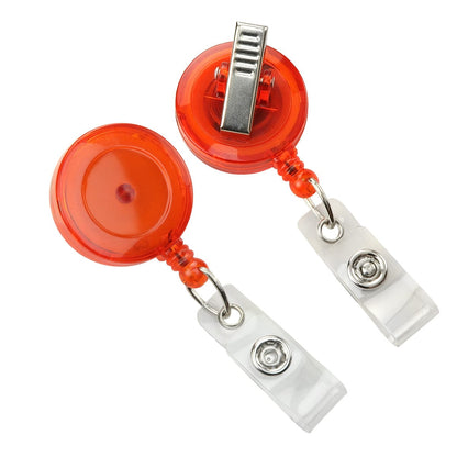 Two Translucent Badge Reels with Swivel Clips (P/N 2120-762X) and clear plastic strap attachments are shown. One is positioned front-facing, while the other displays the back with the clip.