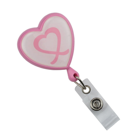 A Heart Shaped Ribbon "Awareness" Badge Reel with Swivel Spring Clip (P/N 2120-7630) featuring a transparent swivel spring clip and a pink heart design in the center.