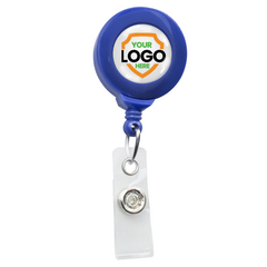 A blue retractable badge holder with a customizable logo space at the center and a clear clip at the bottom, perfect for those aiming to maintain a professional image. These Standard Custom Printed Badge Reels w/ No Twist Design - Add Your Logo to Personalize are ideal to promote brand awareness effectively.