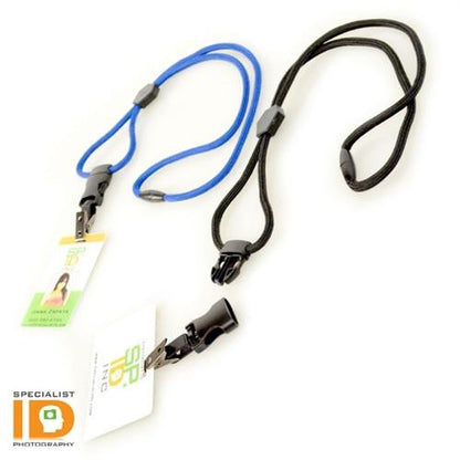 Two Heavy Duty Breakaway Round Lanyards With Detachable Bulldog Clips 2135-451X, one blue and one black, lay on a white surface. Each lanyard holds an ID card with a plastic bulldog clip, ensuring secure attachment.
