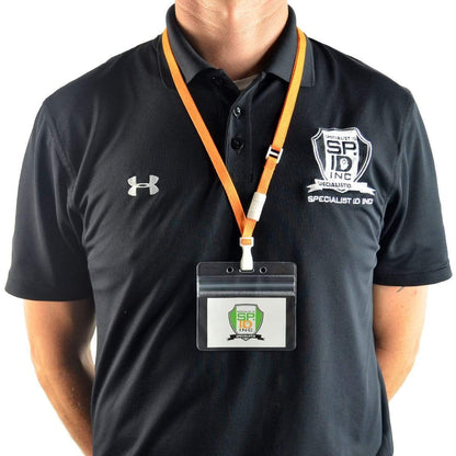 A person wearing a black collared shirt with a badge hanging from an Adjustable Breakaway Lanyards Great For All Sizes (2137-203X) around their neck. The badge has a logo and text "Specialist ID Inc." on it.