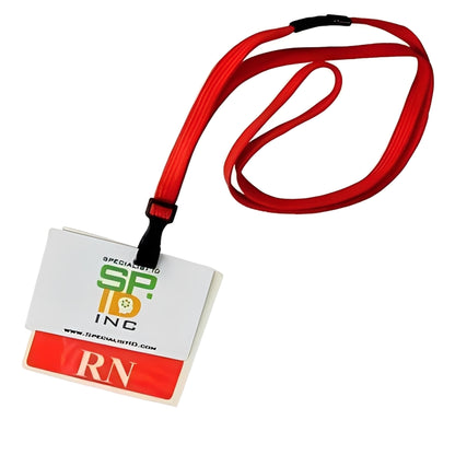 A red breakaway lanyard with a no-twist plastic ID clip—MRI and metal detector friendly (2137-474X)—holds a badge showing the "SP INC" logo and an "RN" label in white on a red background.