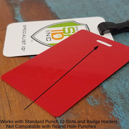 Red badge with a slot for a strap, positioned next to a white card with text and a logo. Caption below states, "Works with Standard Punch ID Slots and Badge Holders. Not Compatible with Round Hole Punches." Pair it perfectly with our Wide 5/8" Lanyard with No Twist Plastic Hook (2138-478X) for added convenience.