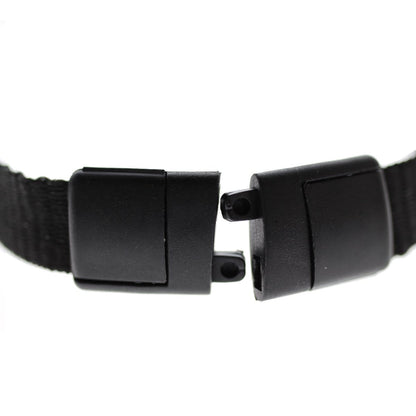 Close-up of a black plastic buckle with one end detached, revealing the two prongs meant to interlock with the corresponding piece, seamlessly integrating into a SlimReel Breakaway Lanyard ID Holder Badge Reel Combo (2138-800X) for added convenience.