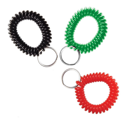 Three Wrist Coil With 7/8" Nickel-Plated Split Ring 2140-630X in black, green, and red feature practical nickel-plated split rings for added durability—perfect as a practical accessory for keeping your keys secure and within easy reach.