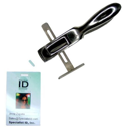 A Hand-Held Slot Punch with Adjustable Guide (3943-1010) and a rectangular clip are positioned above a green and white photo ID card featuring a small photo and text.