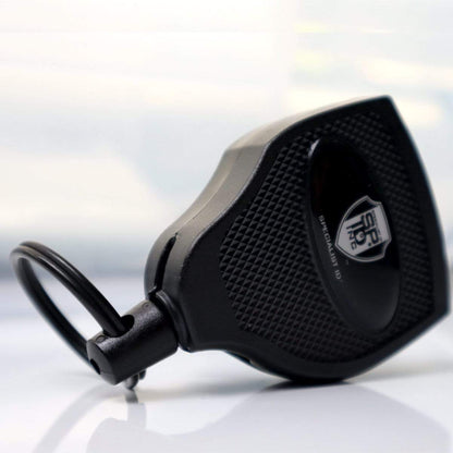 A black Super Heavy Duty Retractable Keychain - 8oz or 10 Keys - Durable 48” (4 Ft) Kevlar Lanyard with a textured grip and a clip for attaching keys or badges, featuring self retracting reels for added convenience.