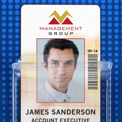 ID badge featuring a headshot of a man, labeled with "Management Group" at the top, and "James Sanderson, Account Executive" below his photo. The badge fits perfectly in a Vinyl Vertical Badge Holder with Flap (506-24FS) with a convenient fold-over flap closure.