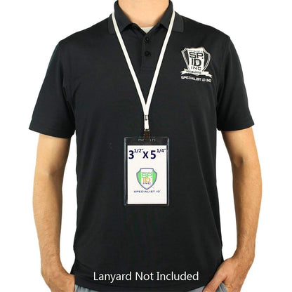 A person wearing a black polo shirt with a logo and an extra large Premium 3 1/2 x 5 1/4 Clear Vinyl Vertical Extra Large Badge Holder (506-46) displaying a label measuring 3.5" x 5.25". The text at the bottom reads "Lanyard Not Included.