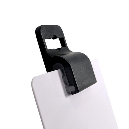 A Gripper 30 Card Clamp (P/N 5710-3050 Black & 5710-3058 White) attached to a white surface, featuring a rectangular cut-out at the top.