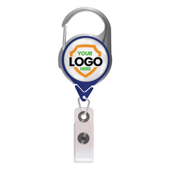 A Custom Printed No Twist Carabiner Badge Reel With Belt Clip - Upload Your Logo with a customizable shield design reading "Your Logo Here," perfect to promote brand awareness. These custom badge reels provide an excellent opportunity to showcase your personalized logo effortlessly.