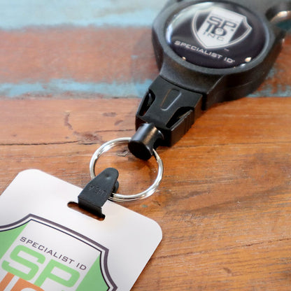 HR-BLACK connector passing through an ID card slot and attached to a badge reel ring
