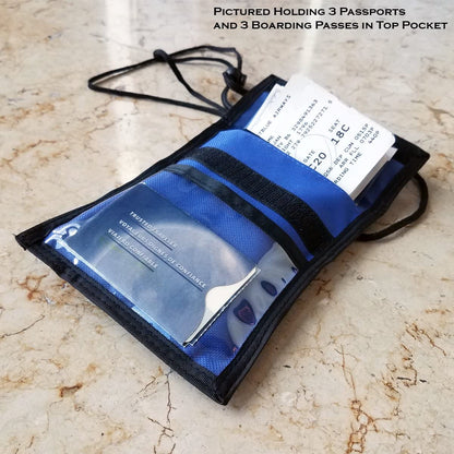 A black Multi-Pocket Credential Neck Wallet with Lanyard (1860-300X) showcasing three passports and three boarding passes in its top pocket, placed on a marble surface.