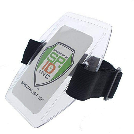 A transparent **Vertical Armband ID Badge Holders with Elastic Band and Hook and Loop Clasp (ABH-V)** securely holds a card labeled "Specialist ID, Inc.