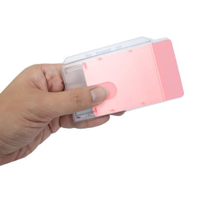 Clear rigid side-load badge holder held in hand for one horizontal ID card.