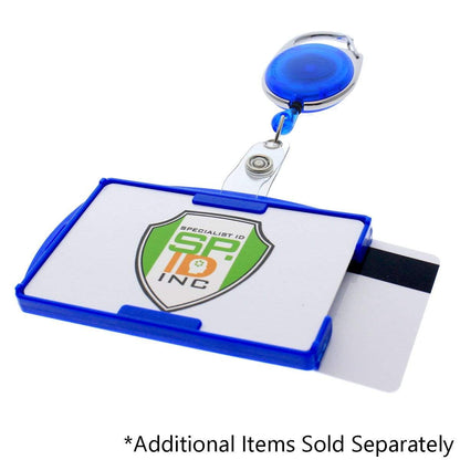 A retractable badge reel with a rigid plastic blue holder displaying a Specialist ID badge. A white card with a magnetic strip partially slides out of the Two Card Holder - Rigid Open-Faced (P/N AH-150). The text below reads, "*Additional Items Sold Separately.