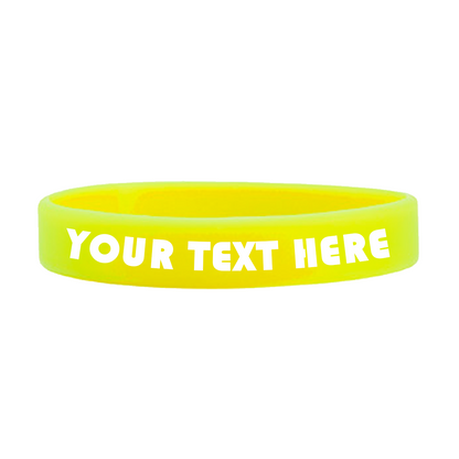 A high-quality Customizable Adult 1/2" Silicone Wristbands with the words "YOUR TEXT HERE" in white, perfect for promoting a cause. Sold by Specialist ID.